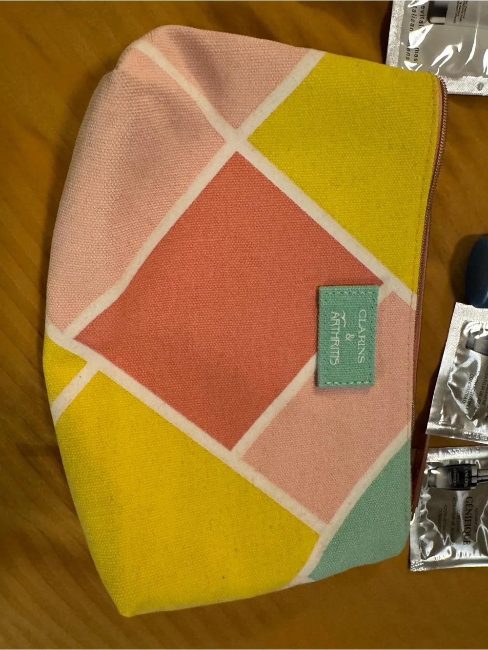Clarins Pouch with Clarins and other product samples